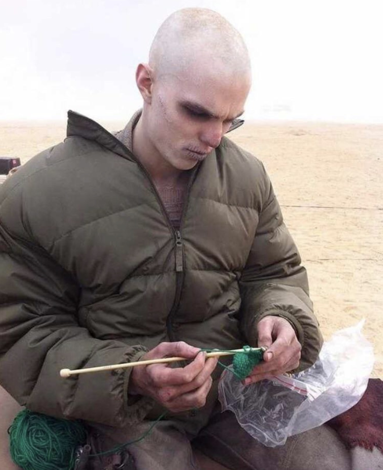 Nicholas Hoult learning how to knit on the set of Max Max: Fury Road, 2015 